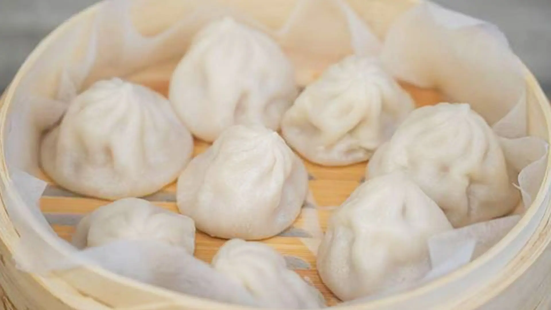 Juicy xiaolongbao with savory filling at Mala Mini Restaurant in Palisades Park.
